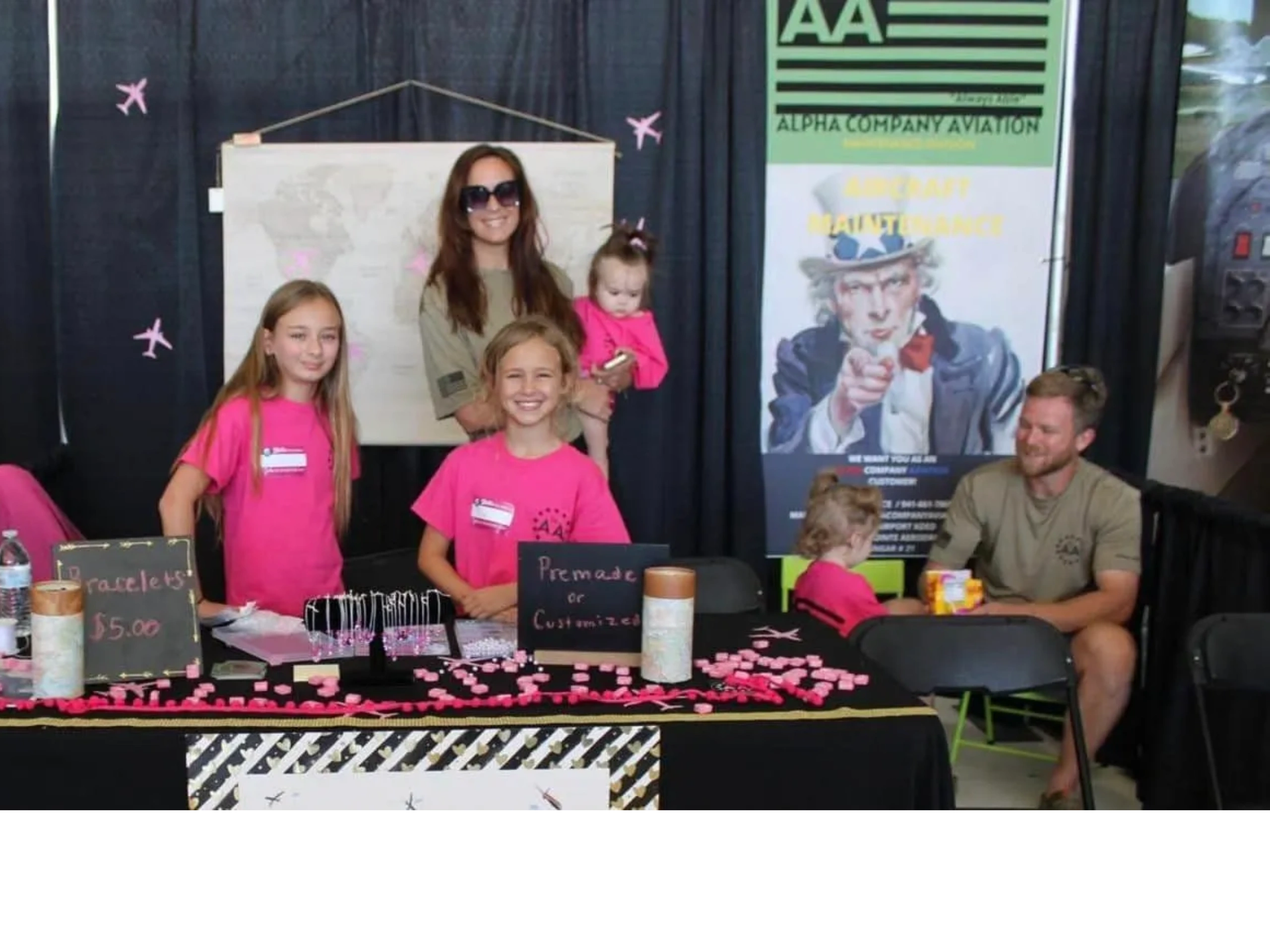 The family team behind Alpha Company Aviation flight school in Venice, FL, with their flight training community